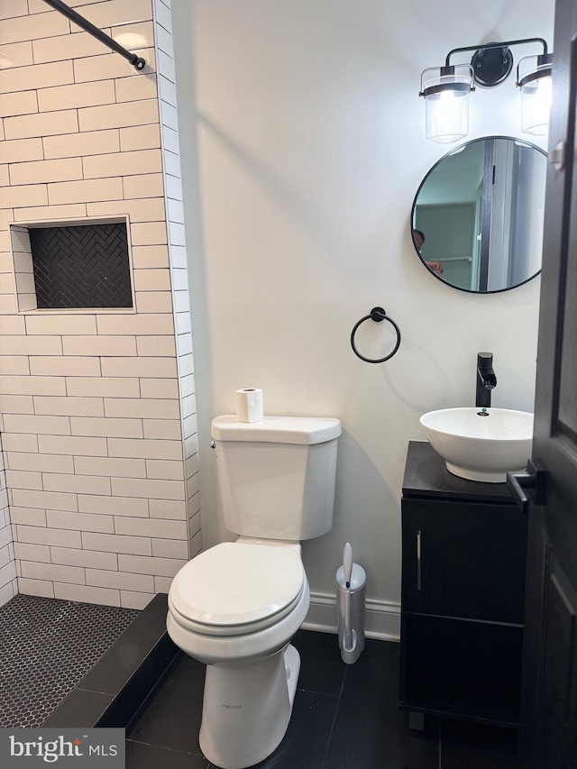 6529 Frietchie Row, Columbia, MD 21045 - full bathroom featuring a tile shower, tile patterned flooring, and vanity