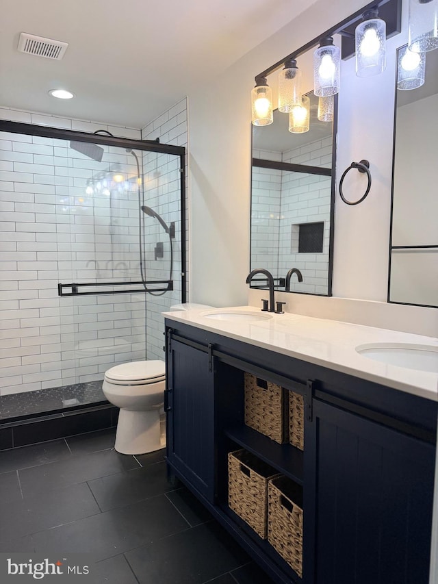6529 Frietchie Row, Columbia, MD 21045 - full bath with tile patterned floors, a shower stall, double vanity, and recessed lighting