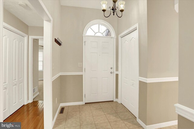 183 Mill Rd, Chambersburg, PA 17201 - entryway featuring a chandelier and light tile patterned floors