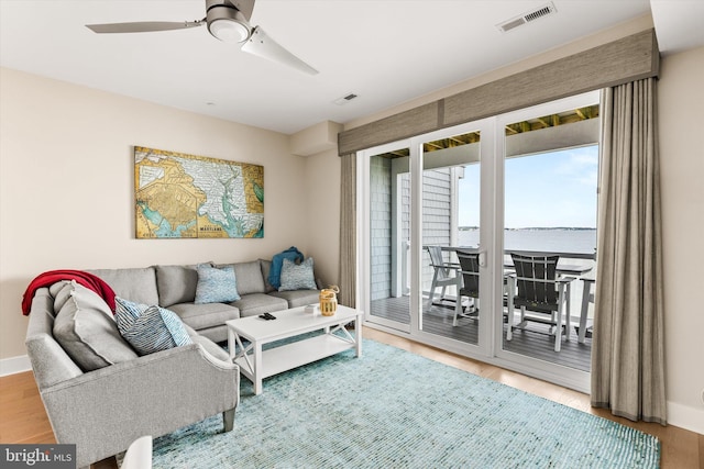220 25th St Unit D, Ocean City, MD 21842 - living area featuring wood finished floors and a ceiling fan
