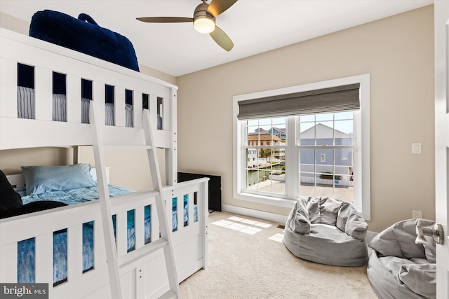 220 25th St Unit D, Ocean City, MD 21842 - bedroom with light carpet and ceiling fan