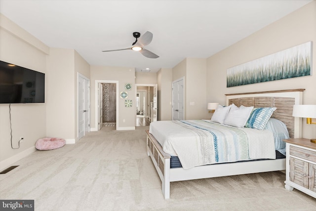 220 25th St Unit D, Ocean City, MD 21842 - bedroom with carpet, connected bathroom, and a ceiling fan