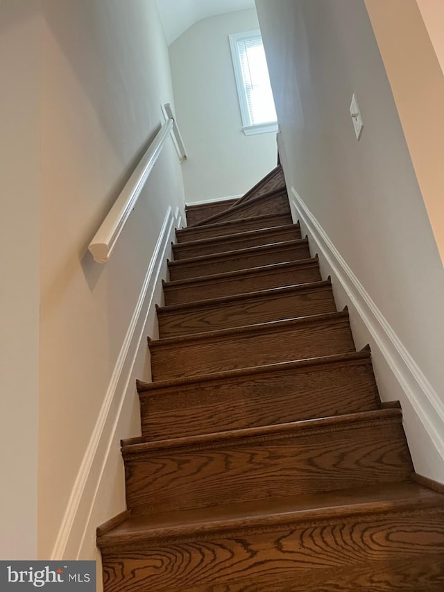 5511 Wesley Ave, Baltimore, MD 21207 - stairs featuring vaulted ceiling