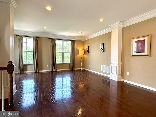 331 Lenape Way, Claymont, DE 19703 - empty room with decorative columns, dark wood-style floors, ornamental molding, and recessed lighting