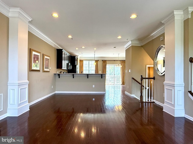 331 Lenape Way, Claymont, DE 19703 - unfurnished living room featuring dark wood-style floors, recessed lighting, decorative columns, and crown molding