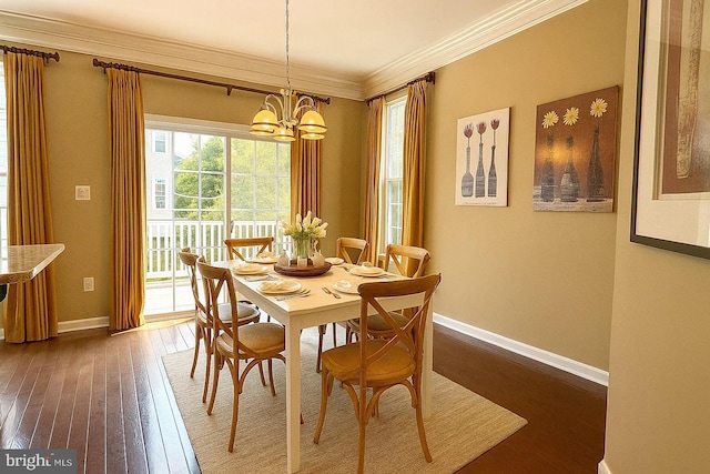331 Lenape Way, Claymont, DE 19703 - dining room featuring dark wood-type flooring, ornamental molding, and a chandelier