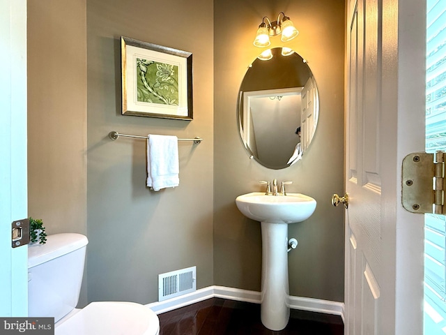 331 Lenape Way, Claymont, DE 19703 - half bathroom featuring toilet and wood finished floors