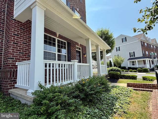 331 Lenape Way, Claymont, DE 19703 - view of side of home featuring brick siding and covered porch