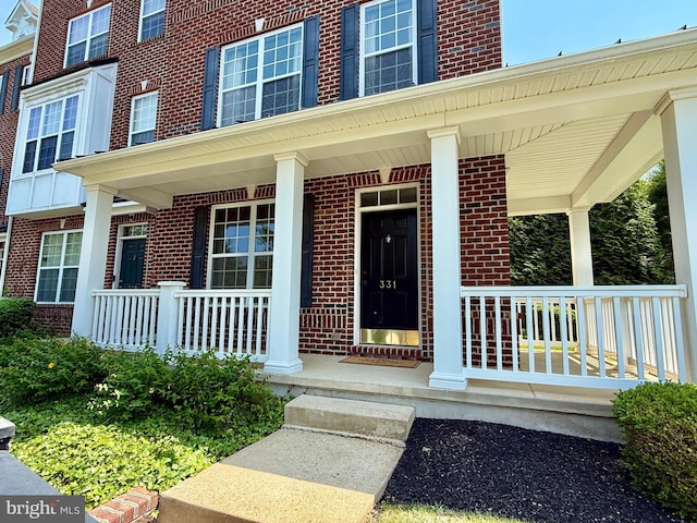 331 Lenape Way, Claymont, DE 19703 - property entrance with a porch and brick siding