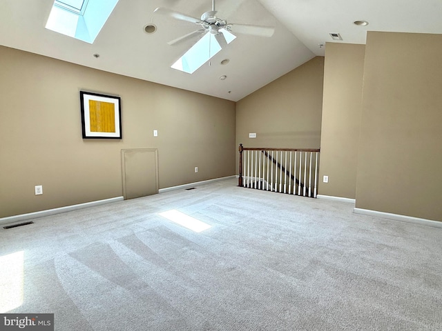 331 Lenape Way, Claymont, DE 19703 - spare room with a skylight, a ceiling fan, carpet flooring, and high vaulted ceiling