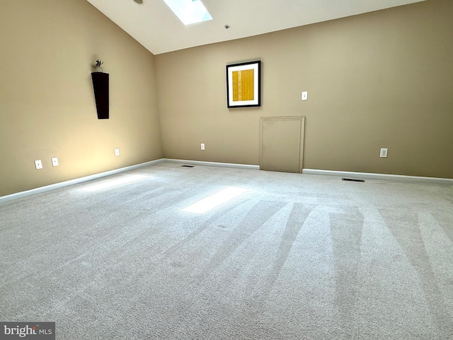 331 Lenape Way, Claymont, DE 19703 - carpeted empty room with vaulted ceiling and a skylight
