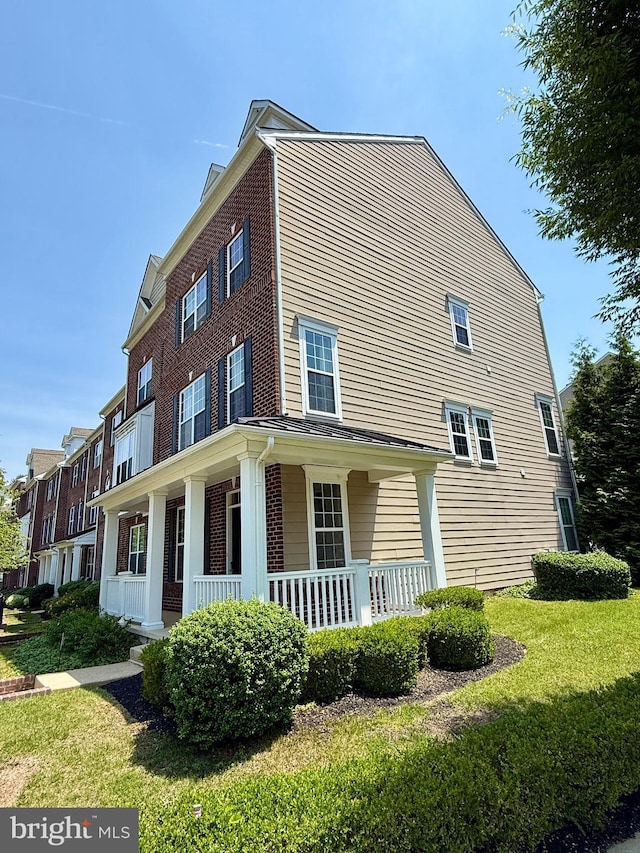 331 Lenape Way, Claymont, DE 19703 - view of side of property with a porch and a yard