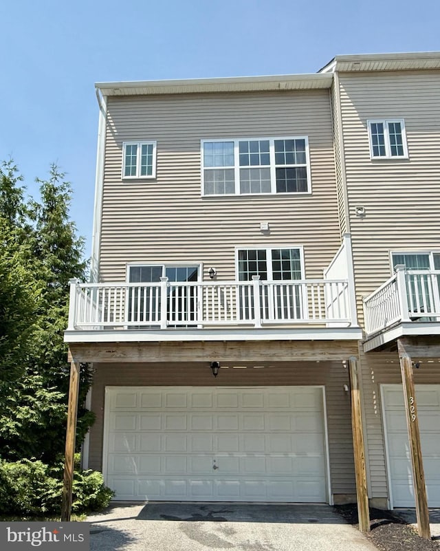 331 Lenape Way, Claymont, DE 19703 - back of property featuring a balcony and an attached garage