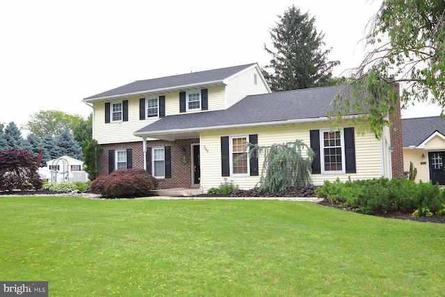 146 Skyline Dr, New Holland, PA 17557 - view of front of house with a front lawn and brick siding