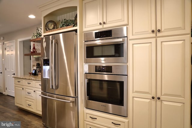 146 Skyline Dr, New Holland, PA 17557 - kitchen with appliances with stainless steel finishes, cream cabinetry, open shelves, dark wood-style flooring, and recessed lighting