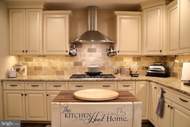 146 Skyline Dr, New Holland, PA 17557 - kitchen with wall chimney range hood, stainless steel gas stovetop, butcher block countertops, and backsplash