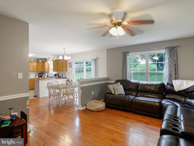 6 Thompson Ct, Boonsboro, MD 21713 - living area with a ceiling fan, light wood finished floors, and a chandelier