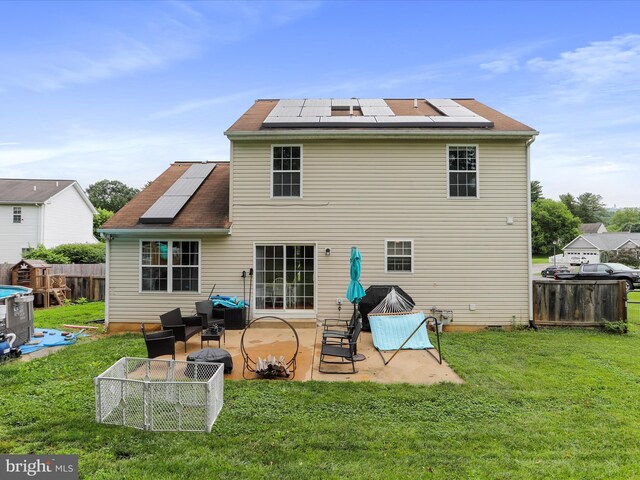 6 Thompson Ct, Boonsboro, MD 21713 - back of house with solar panels, a patio, and a fenced backyard