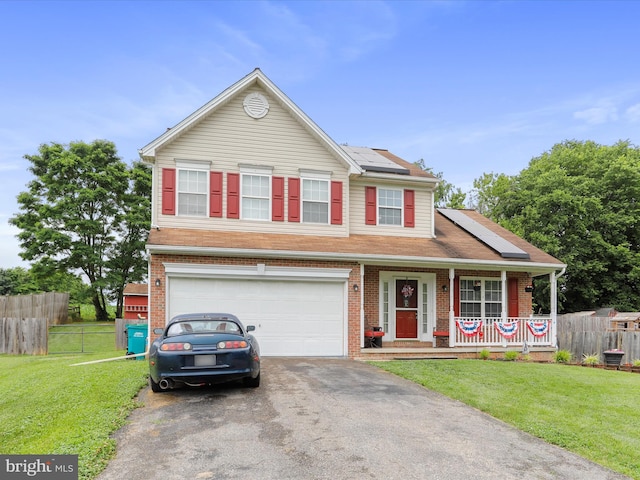 6 Thompson Ct, Boonsboro, MD 21713 - traditional-style home with driveway, covered porch, an attached garage, roof mounted solar panels, and brick siding