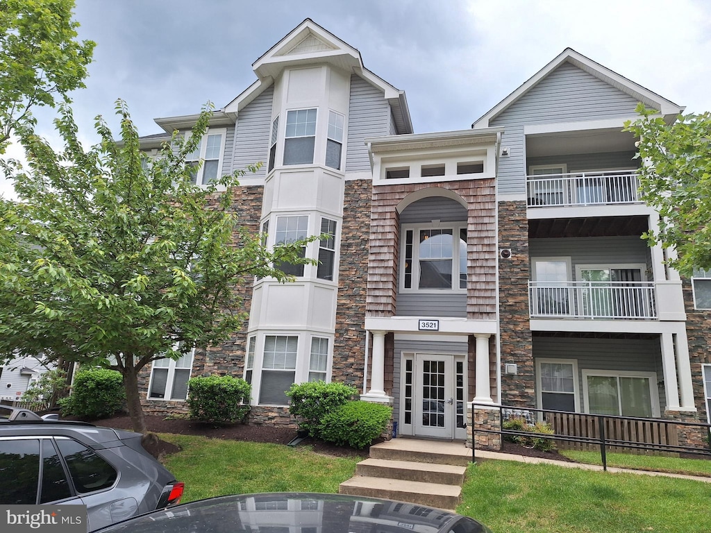 3521 Piney Woods Pl Unit F303, Laurel, MD 20724 - view of front of house featuring stone siding and french doors