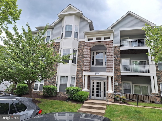 3521 Piney Woods Pl Unit F303, Laurel, MD 20724 - view of front of house featuring stone siding and french doors