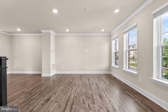 7955 Blue Stream Dr, Elkridge, MD 21075 - empty room featuring wood finished floors, ornamental molding, plenty of natural light, and recessed lighting