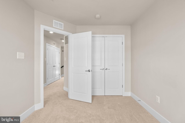 7955 Blue Stream Dr, Elkridge, MD 21075 - unfurnished bedroom with light carpet and a closet