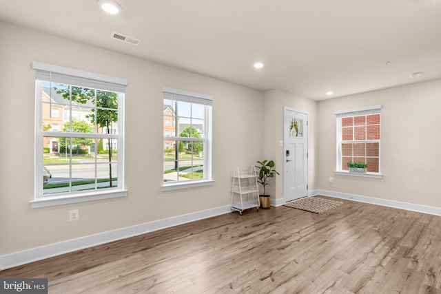7955 Blue Stream Dr, Elkridge, MD 21075 - foyer entrance with wood finished floors and recessed lighting