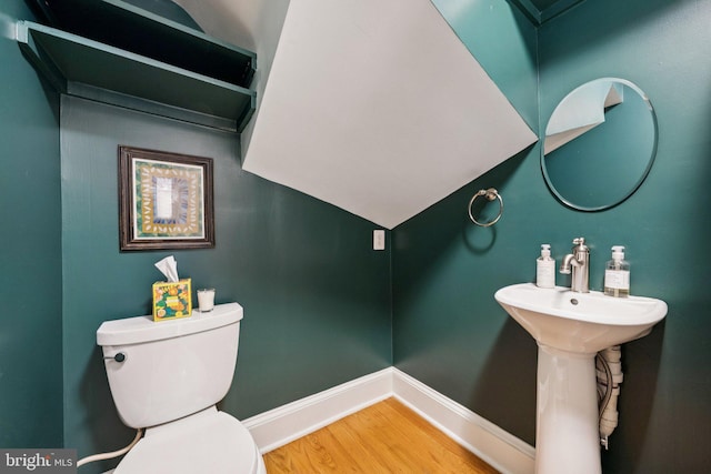 636 N Alfred St, Alexandria, VA 22314 - half bathroom featuring wood finished floors and baseboards