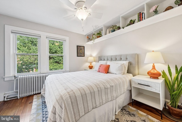 636 N Alfred St, Alexandria, VA 22314 - bedroom with radiator heating unit, wood finished floors, and ceiling fan