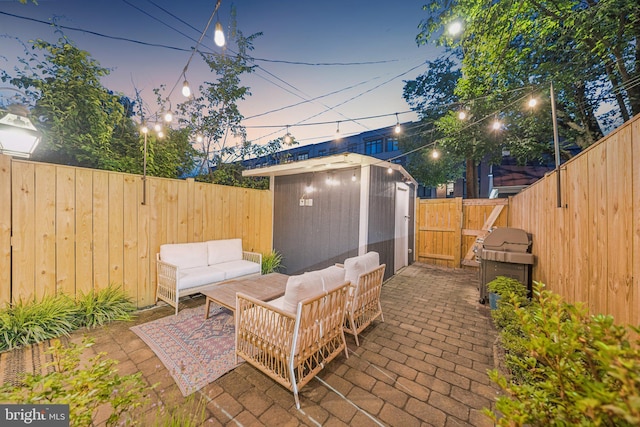 636 N Alfred St, Alexandria, VA 22314 - fenced backyard featuring a storage shed, a patio area, area for grilling, and outdoor lounge area