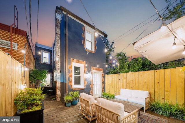 636 N Alfred St, Alexandria, VA 22314 - fenced backyard featuring an outdoor living space and a patio