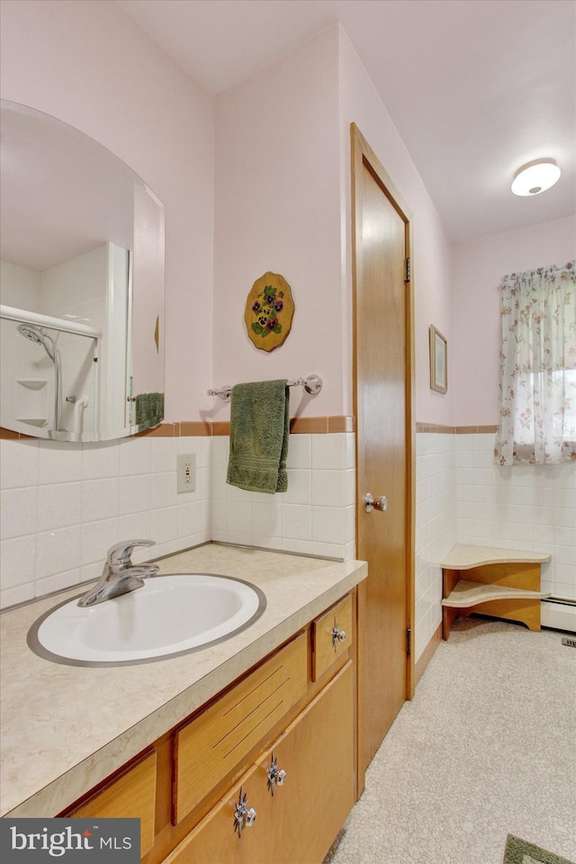 401 Jacobs St, East Berlin, PA 17316 - full bath featuring vanity, a baseboard radiator, tile walls, and wainscoting