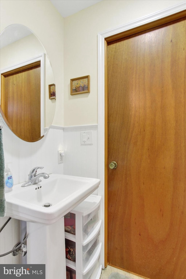 401 Jacobs St, East Berlin, PA 17316 - bathroom with a wainscoted wall and a decorative wall
