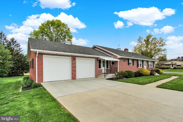 401 Jacobs St, East Berlin, PA 17316 - ranch-style home featuring a garage, brick siding, a chimney, and concrete driveway