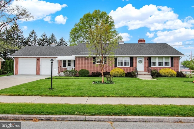 401 Jacobs St, East Berlin, PA 17316 - view of front of house with a chimney, an attached garage, and brick siding
