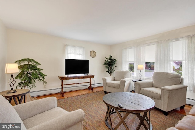 401 Jacobs St, East Berlin, PA 17316 - living area featuring a baseboard radiator and wood finished floors