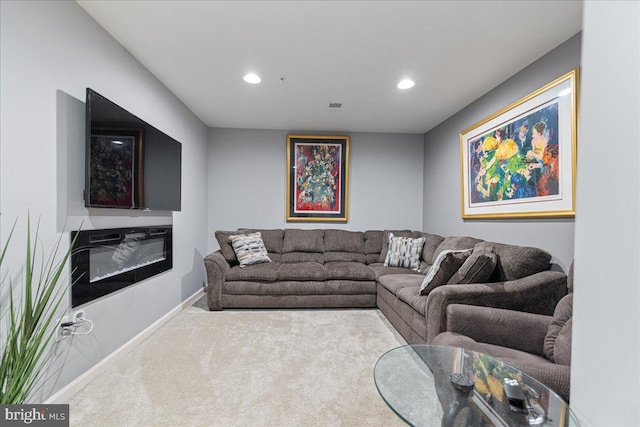 260 Grace Ln, Harleysville, PA 19438 - carpeted living area with recessed lighting and a glass covered fireplace