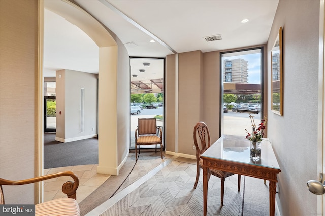 8370 Greensboro Dr Unit 1011, Mclean, VA 22102 - office space featuring arched walkways, light tile patterned flooring, and recessed lighting