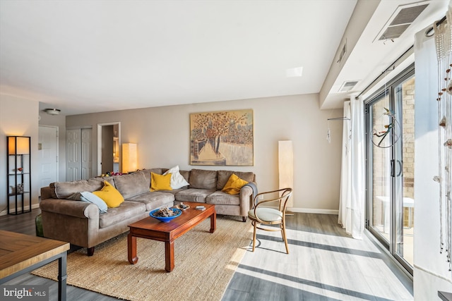 8370 Greensboro Dr Unit 1011, Mclean, VA 22102 - living room with wood finished floors and baseboards