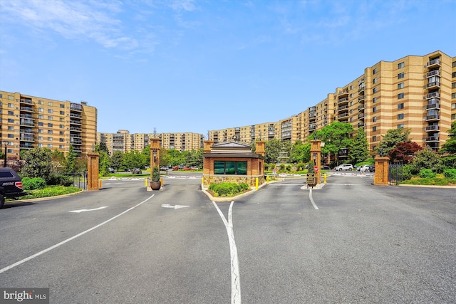 8370 Greensboro Dr Unit 1011, Mclean, VA 22102 - view of asphalt road featuring curbs and a gated entry