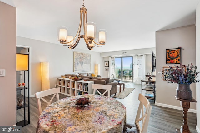 8370 Greensboro Dr Unit 1011, Mclean, VA 22102 - dining space with a chandelier and wood finished floors