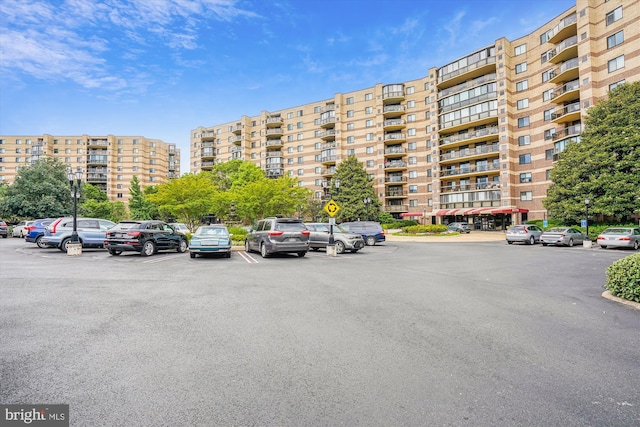 8370 Greensboro Dr Unit 1011, Mclean, VA 22102 - view of apartment building / complex featuring uncovered parking