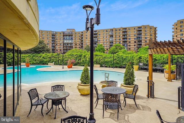 8370 Greensboro Dr Unit 1011, Mclean, VA 22102 - community pool featuring a pergola