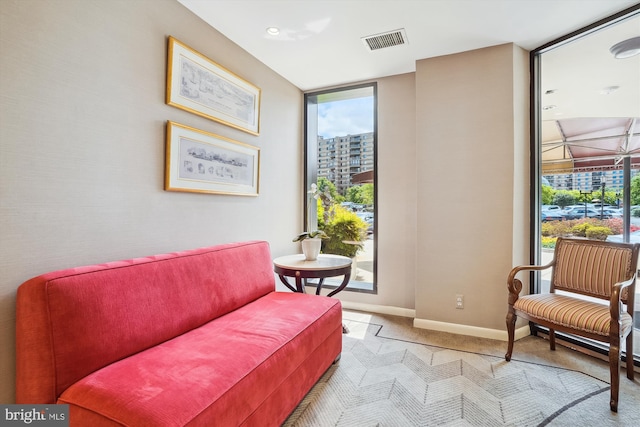 8370 Greensboro Dr Unit 1011, Mclean, VA 22102 - living area featuring light carpet and baseboards