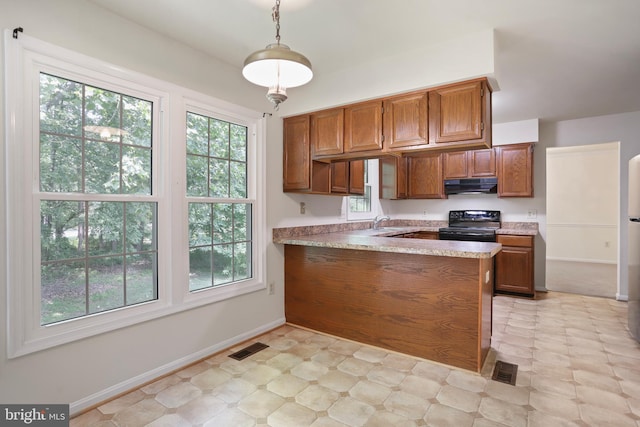 15108 Plum Tree Way, Bowie, MD 20721 - kitchen featuring exhaust hood, black electric range oven, brown cabinetry, light countertops, and a peninsula