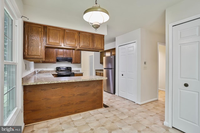 15108 Plum Tree Way, Bowie, MD 20721 - kitchen with black / electric stove, freestanding refrigerator, ventilation hood, a peninsula, and light floors