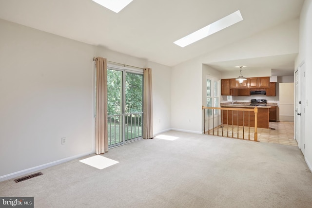 15108 Plum Tree Way, Bowie, MD 20721 - unfurnished living room with a skylight, light carpet, and high vaulted ceiling