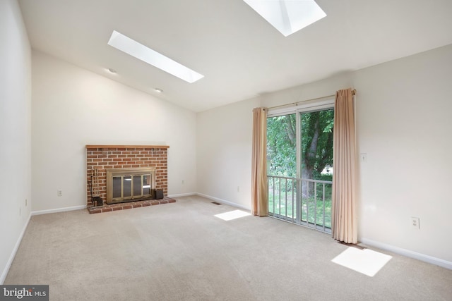 15108 Plum Tree Way, Bowie, MD 20721 - unfurnished living room with a skylight, vaulted ceiling, carpet, and a brick fireplace