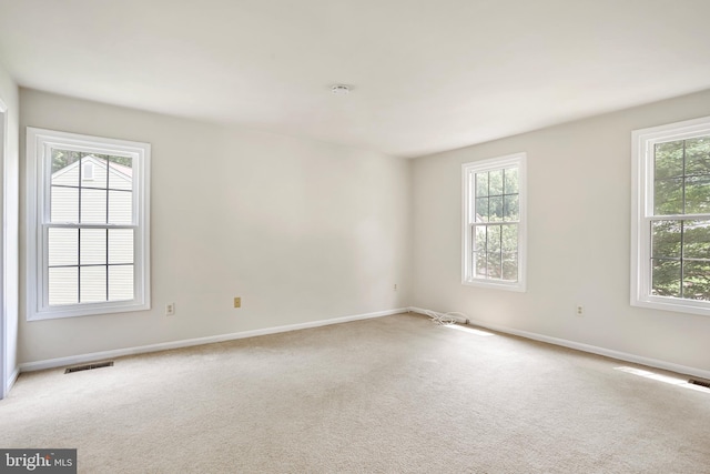 15108 Plum Tree Way, Bowie, MD 20721 - carpeted empty room featuring plenty of natural light and a smoke detector